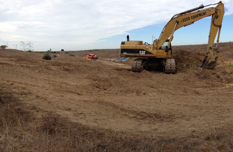 excavator in dirt worksite