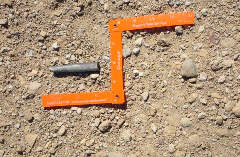 munitions found on ground with ruler